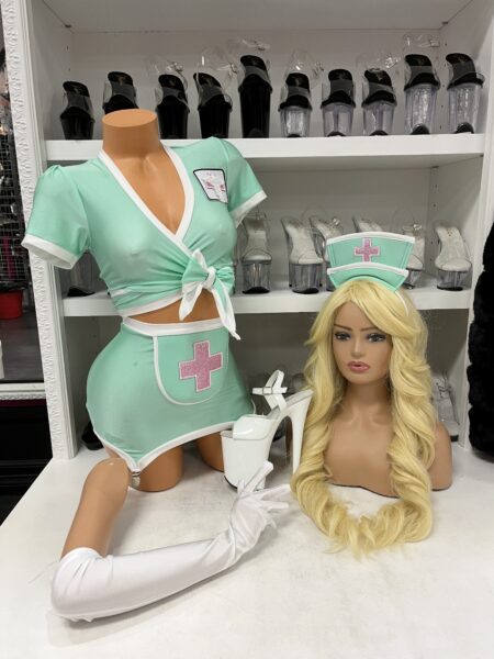 Mint green scrubs nurse costume with white trim and pink glitter cross patches
