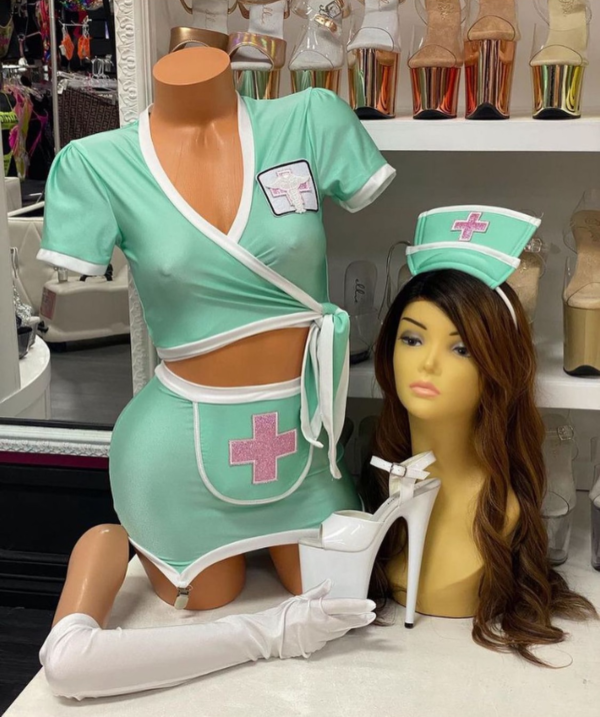 Mint green scrubs nurse costume with white trim and pink glitter cross patches