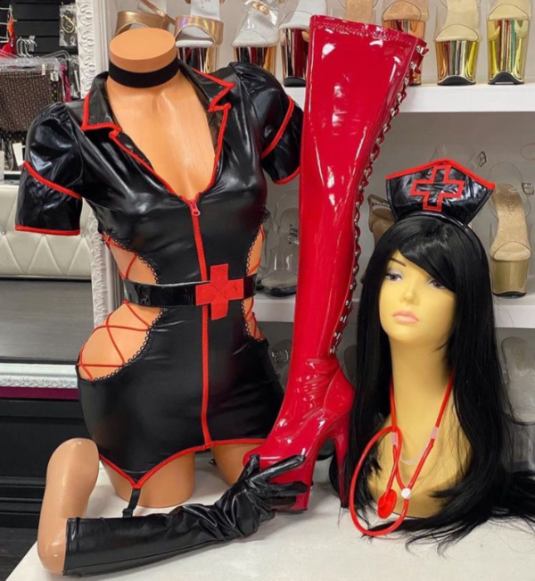 Black wet look nurse costume with red lace-up details and side cutouts