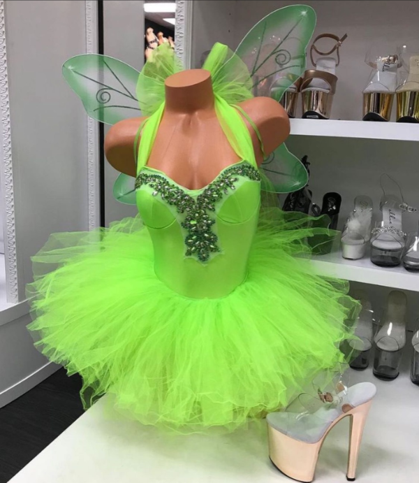 Bright green fairy costume with sequined teddy and fluffy tutu skirt with wings