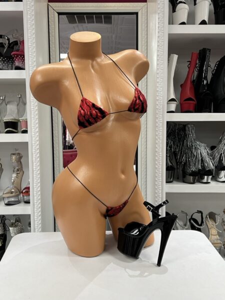 Crimson Flame Micro Bikini featuring shimmering red and black flame print, adjustable string ties, and matching micro thong.