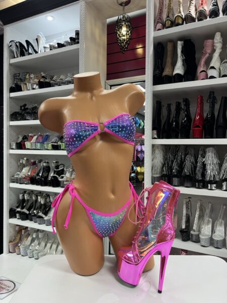Iridescent rhinestone bandeau bikini set with rainbow shimmer and adjustable bottoms displayed with hot pink holographic heels