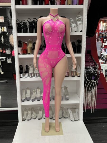 Mannequin wearing neon pink fishnet bodysuit with asymmetrical leg design