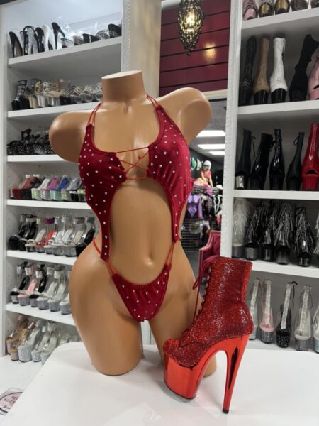 Red rhinestone romper with lace-up front and cutout details