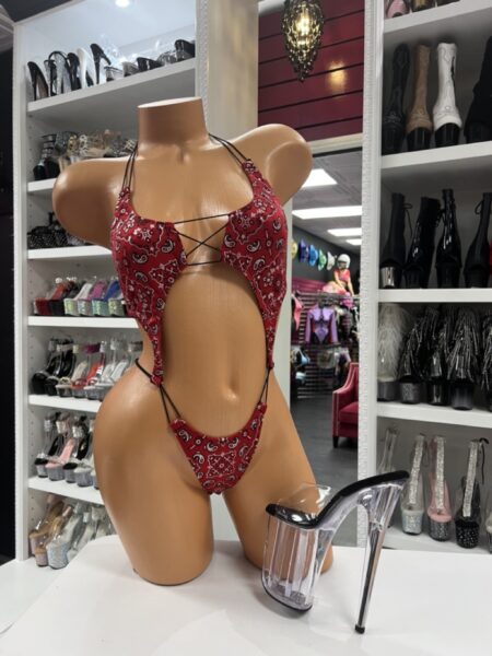 Red paisley romper with lace-up front and western print details