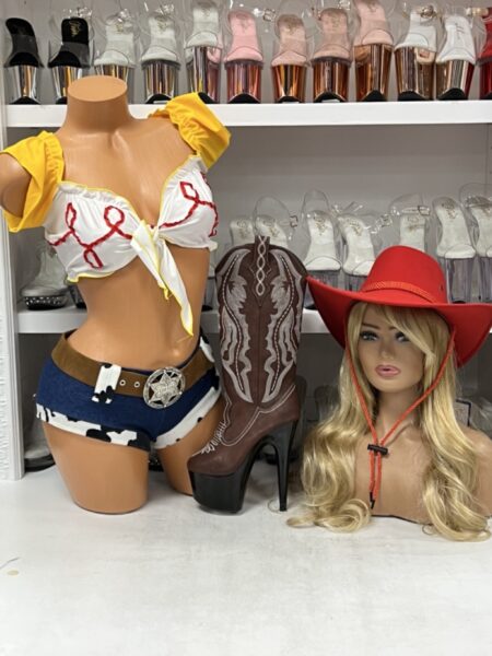 Playful story cowgirl western costume with yellow ruffles and denim shorts