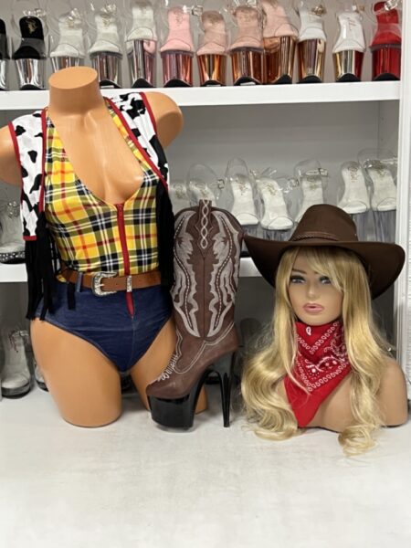 “Western Story Playmate costume with plaid romper, vest, belt, and red bandana by Roma”