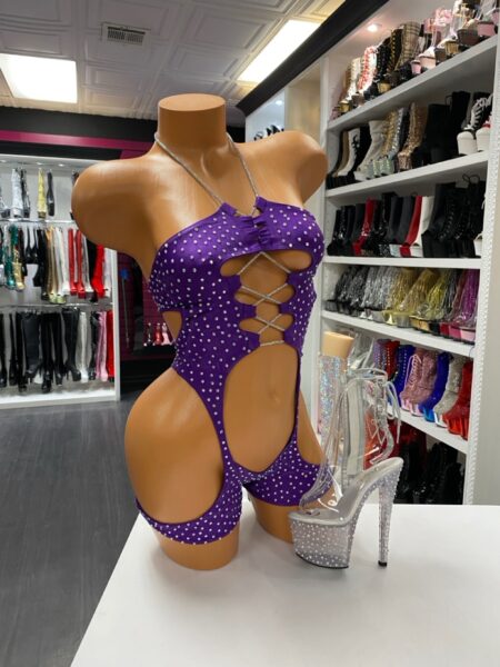 Purple rhinestone cutout bodysuit with halter neckline and crisscross details