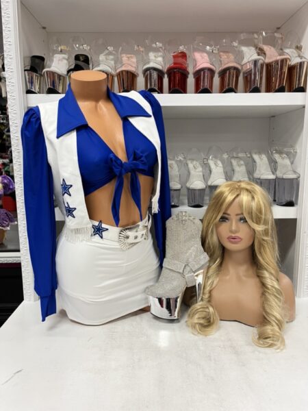 Halftime Show Costume with blue tie-front crop top, vest, mini skirt, and matching belt