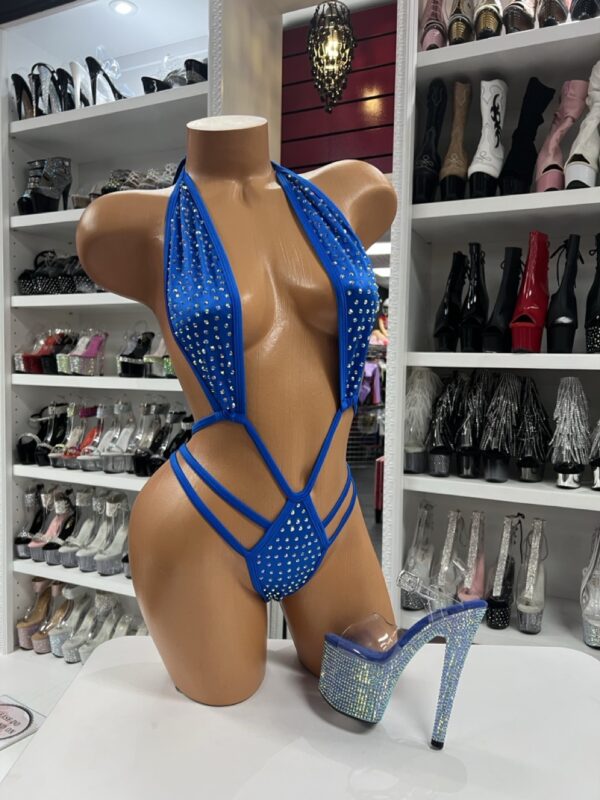Blue rhinestone cutout bodysuit on mannequin with platform heels