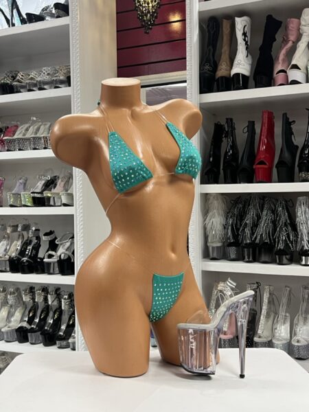 Teal rhinestone micro bikini with daring cut and sparkling rhinestones for bold stagewear