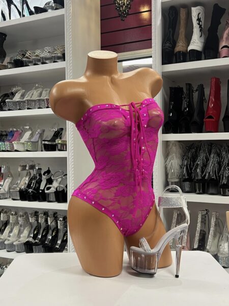 Hot pink lace bodysuit with corset lacing and sheer mesh panels