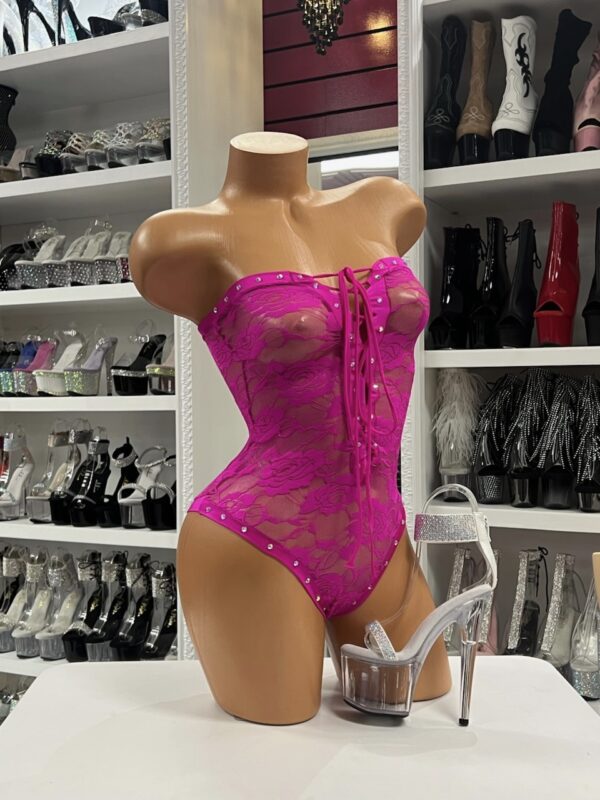 Hot pink lace bodysuit with corset lacing and sheer mesh panels