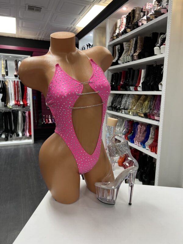 Hot pink rhinestone bodysuit with cutout details and sparkling embellishments