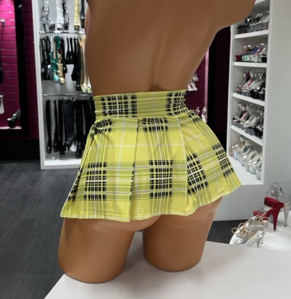 Yellow plaid pleated skirt with high waist on mannequin, front and back view