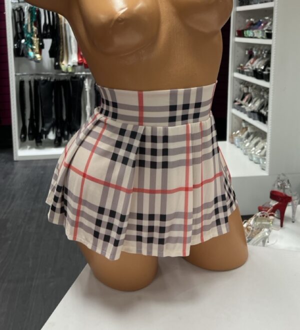 Beige plaid pleated skirt with high waist and short hemline