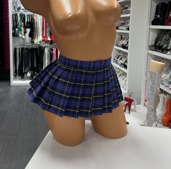 Blue plaid pleated mini skirt with yellow accents