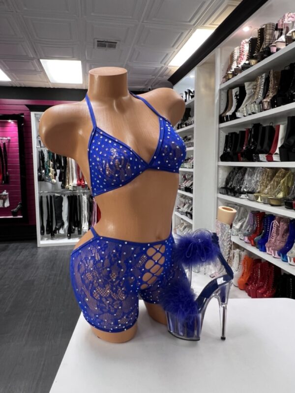 Royal blue fishnet short set with rhinestone details and lace-up sides