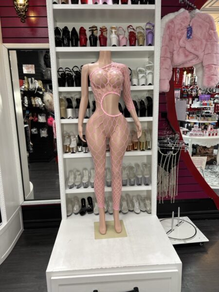 Pink fishnet one-sleeve cutout catsuit with waist cutout displayed on mannequin