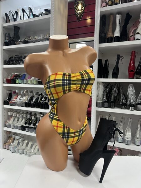 Yellow Plaid Cutout Bodysuit with bandeau top and daring cutout design, displayed with black Pleaser platform heels.