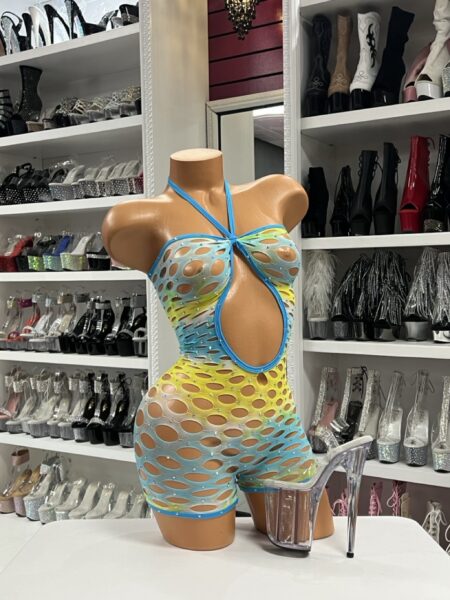 Mannequin wearing neon cutout halter romper with oval cutouts and rhinestone accents for stagewear and nightlife fashion