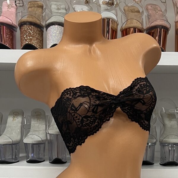 Elegant black lace bandeau crop top on mannequin display