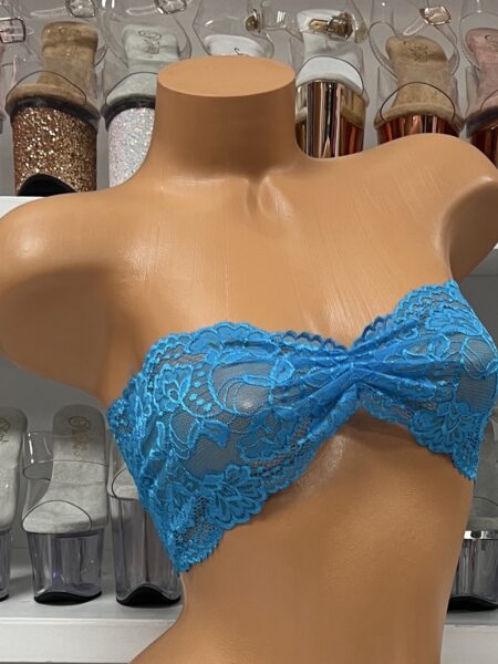 Stunning turquoise lace bandeau crop top on mannequin display
