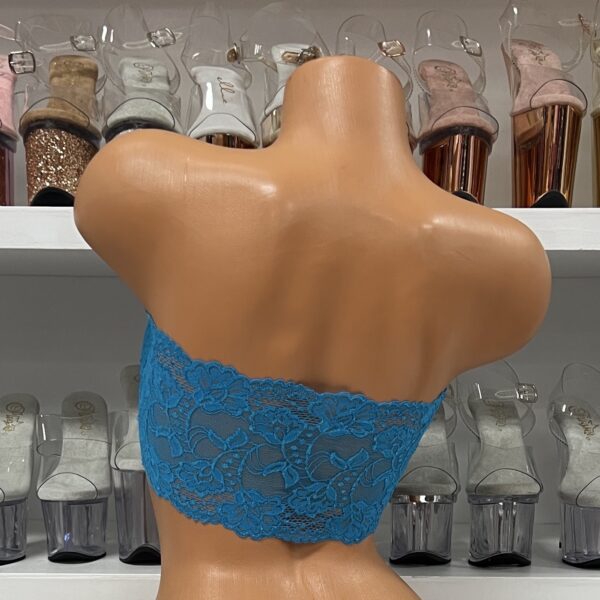 Stunning turquoise lace bandeau crop top on mannequin display