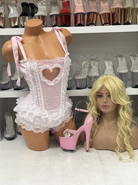 “Sweetheart Ruffle Bodysuit in pink with ruffles and heart cutout”