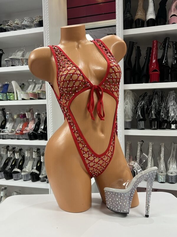 Red fishnet cutout bodysuit with rhinestone accents