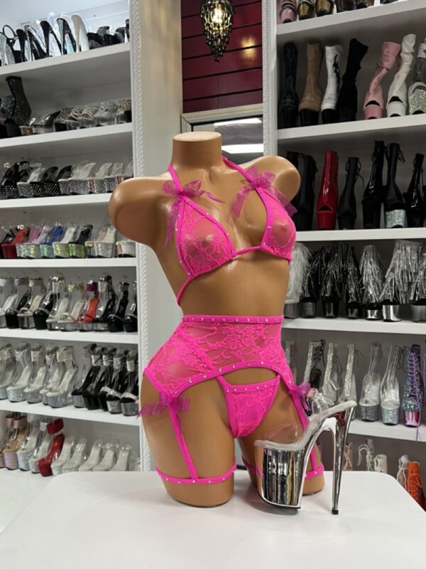 Hot pink lace garter belt set with bow details, rhinestones, and triangle top