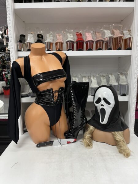 Black horror costume set with corset romper, mask and bloody knife accessories