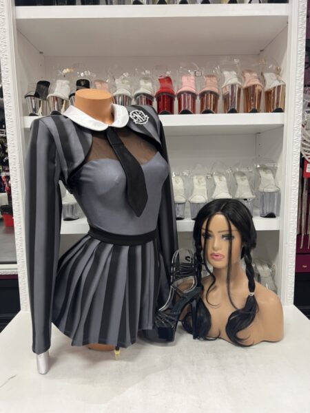 Class On Wednesday Costume featuring black pleated skirt, garter bodysuit, and cropped jacket