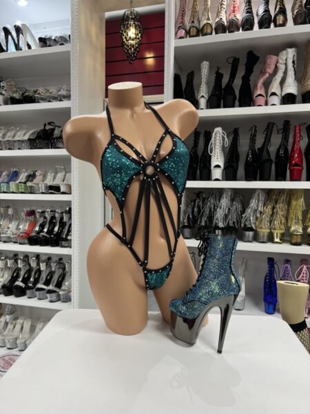 Aqua and black sequin romper with o-ring harness strappy detail front view