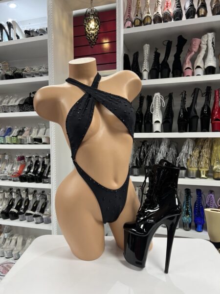 Black criss cross romper with open back strappy design front view