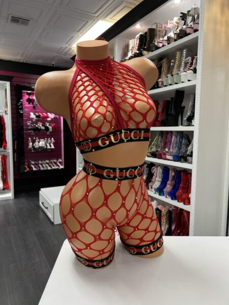 Red fishnet halter top and shorts with designer-inspired elastic trim for exotic dancers