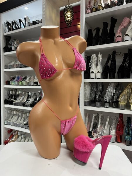 Pink rhinestone string bikini on mannequin with pink platform heels