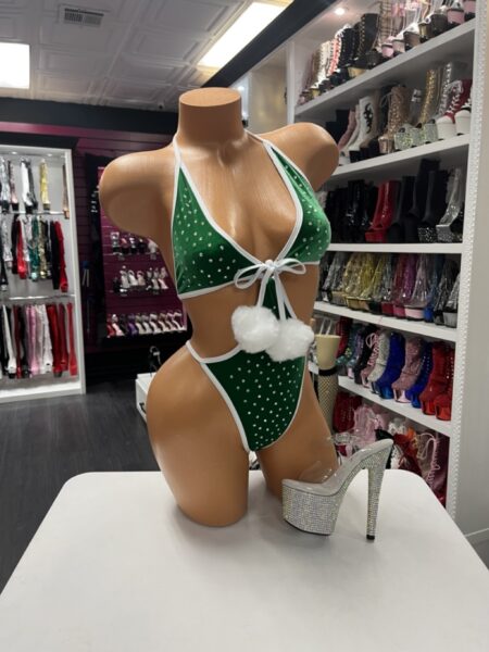 “Green velvet rhinestone bikini with white trim and pom-poms (shoes not included)”
