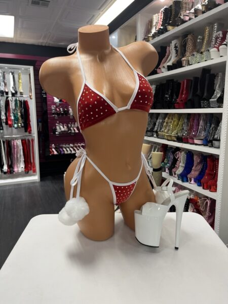 “Red velvet rhinestone bikini with white trim and pom-poms (shoes not included)”