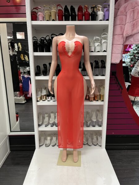 Red sheer maxi dress with lace-up front displayed on mannequin