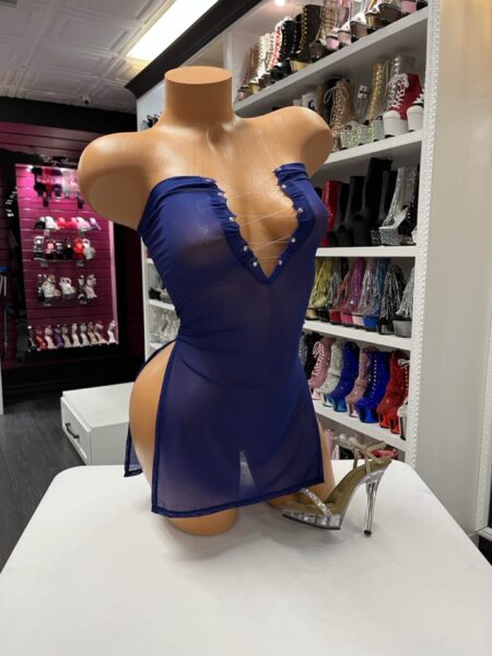 Sheer blue mini dress with lace-up front displayed on mannequin