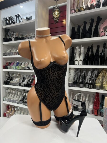 black velvet leopard bodysuit on mannequin with garter straps