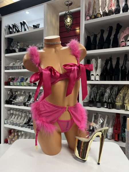 pink ribbon feather lingerie set on mannequin
