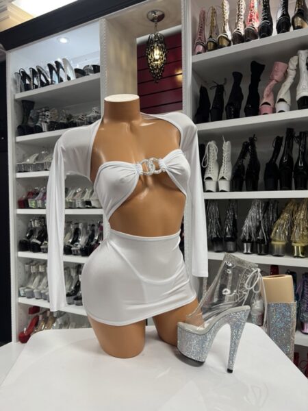white rhinestone mini set with long sleeves displayed on mannequin