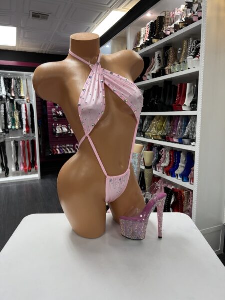 Pink rhinestone slingshot bodysuit with sheer mesh and adjustable halter straps
