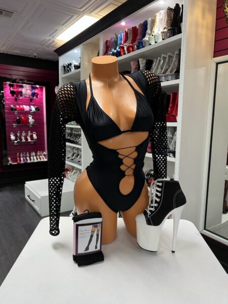 Shadow mesh lace bodysuit with long mesh sleeves and lace-up front displayed on mannequin