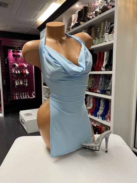 Sky blue halter mini dress with draped neckline and fitted silhouette displayed on mannequin