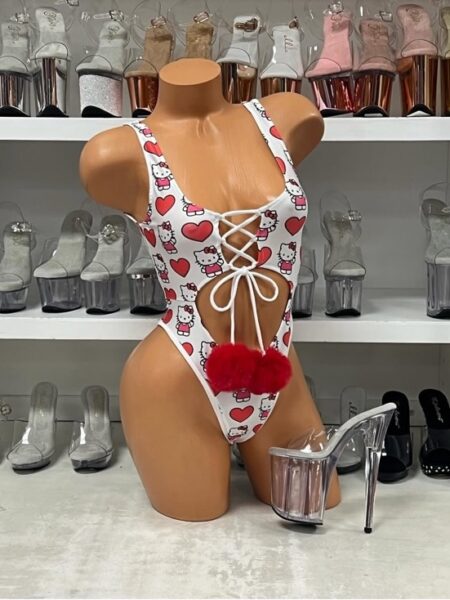 Kitty heart lace bodysuit with lace-up front and red pom accent