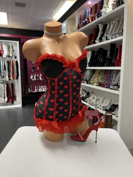 Red heart print corset bodysuit with ruffle trim and bow accents