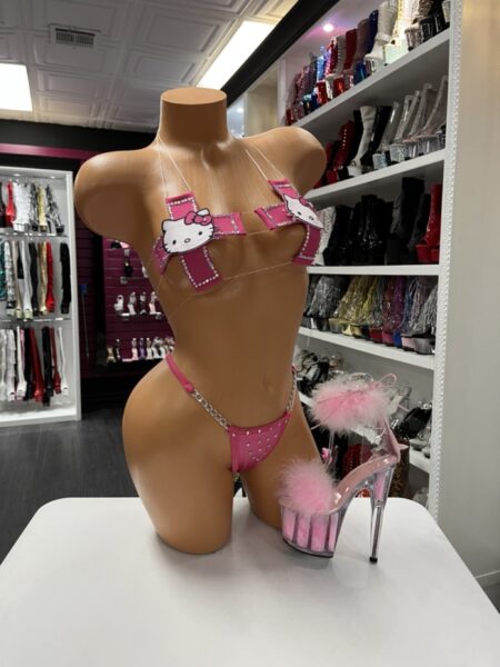 Pink rhinestone bow bikini set with clear straps and chain hip detail